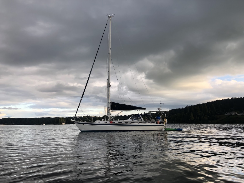 The sailboat Pulsar with overcast skies in the background
